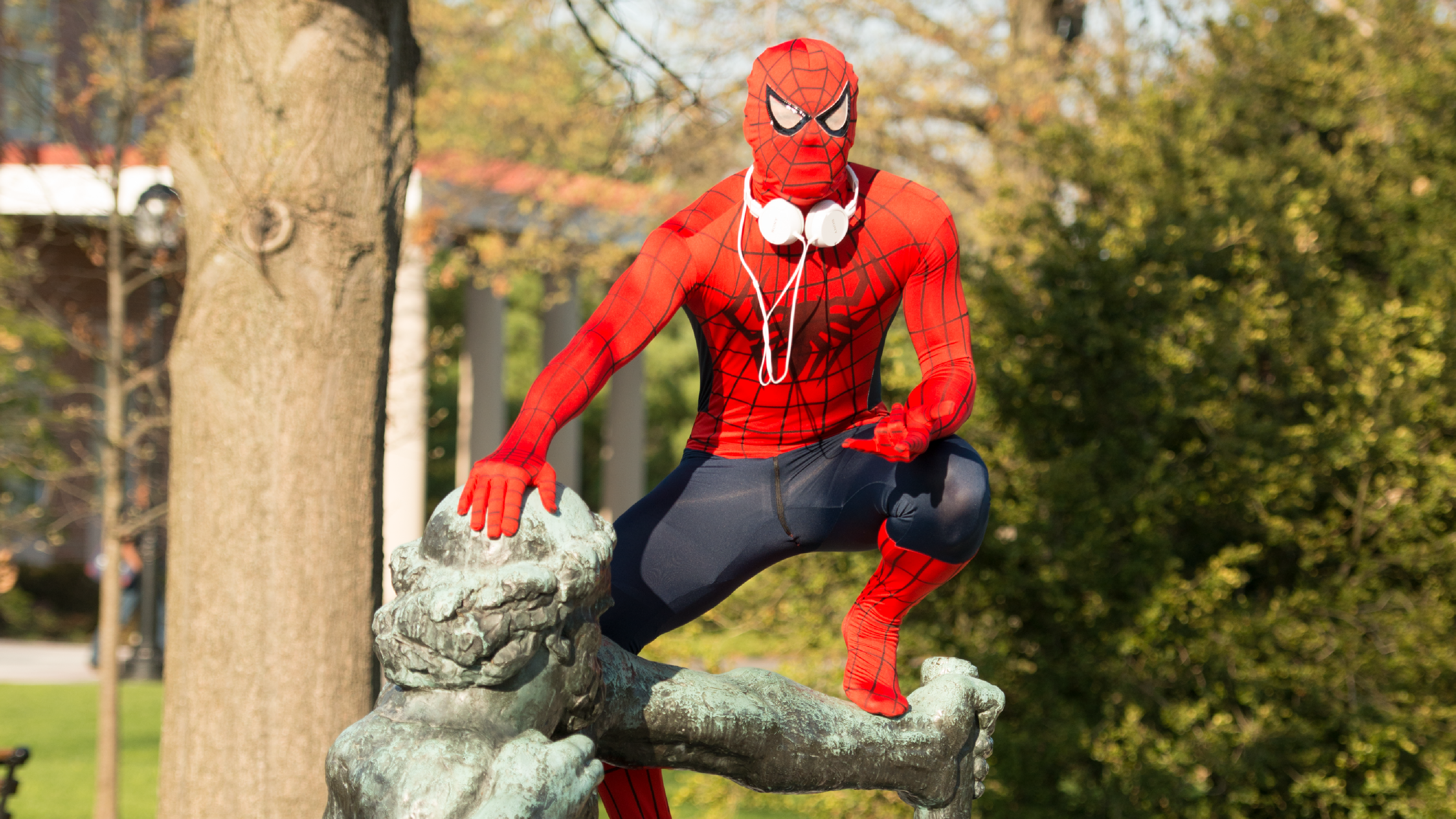 student in Spiderman costume